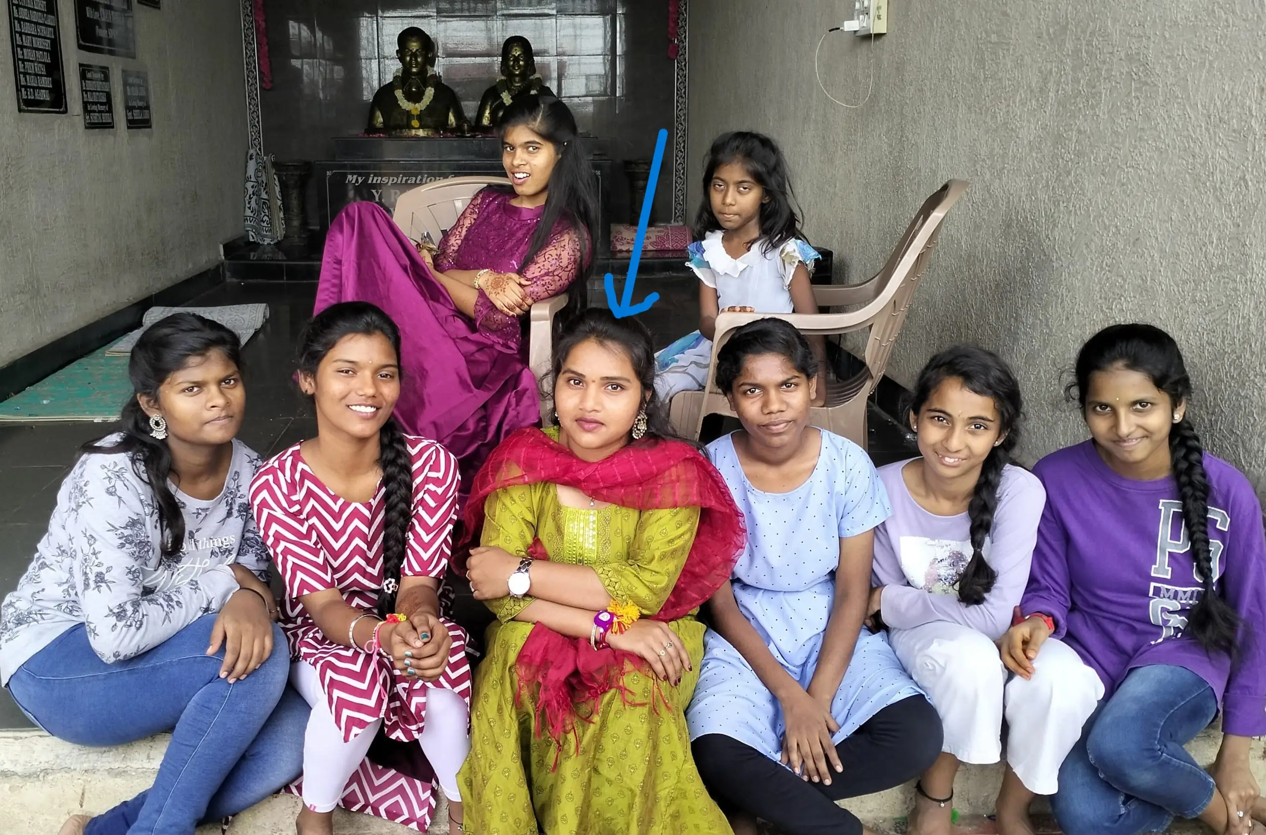 A group of women posing for a photo AI-generated content may be