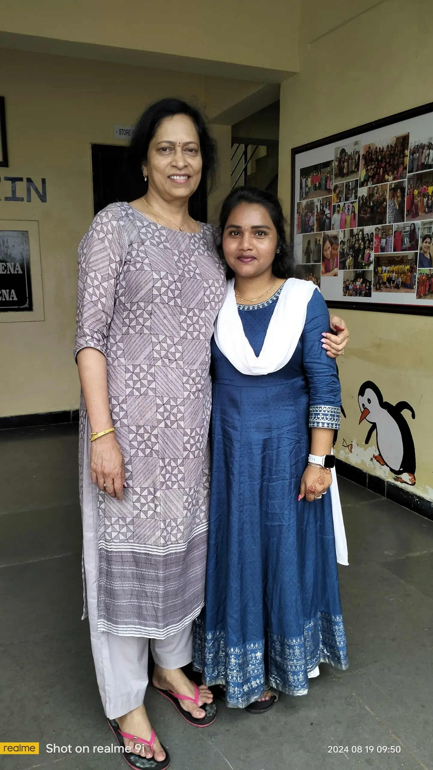 Two women standing together smiling AI-generated content may be incorrect
